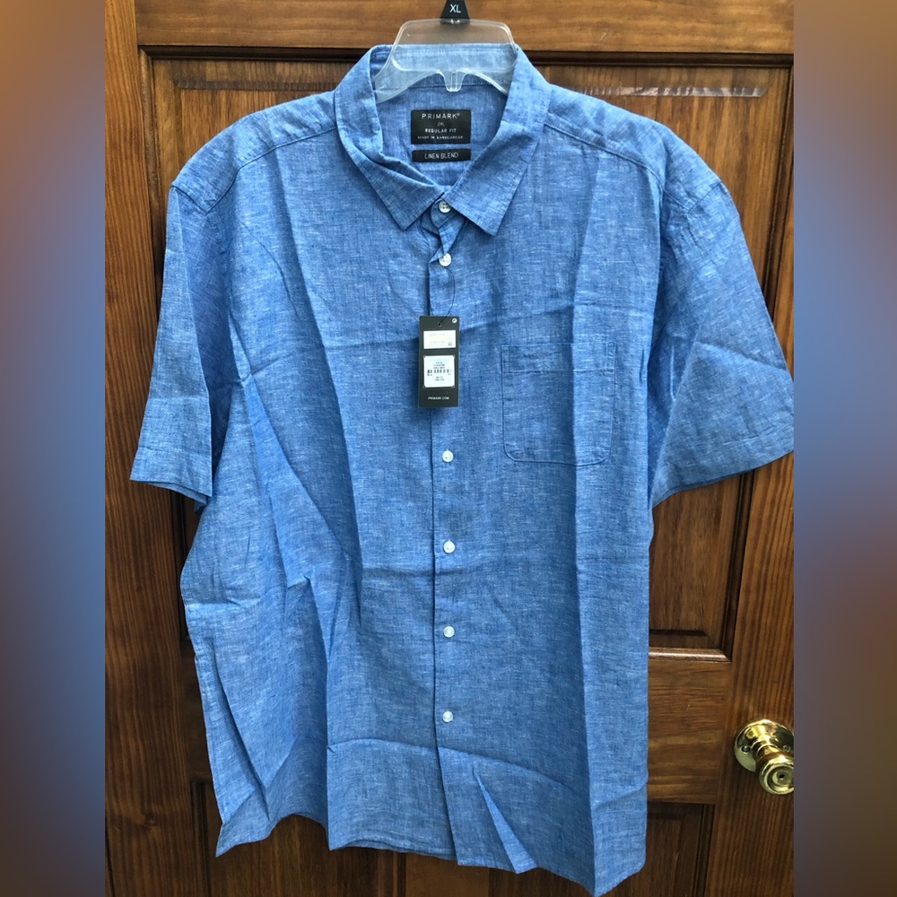 Blue button down short sleeve shirt.